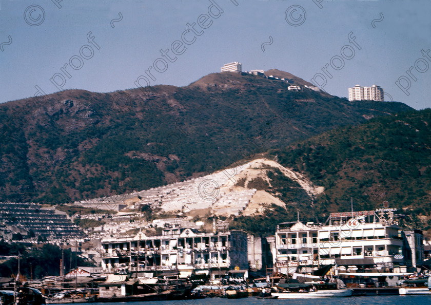 PMR.HK-33 
 Hong Kong 1958: view of Aberdeen fishing village and sampans from Aplichau Island. Behind, a Chinese graveyard on the mountainside, and hotels on the top. 
 Keywords: British colonies, nostalgia, historic, island, tropics, Far East