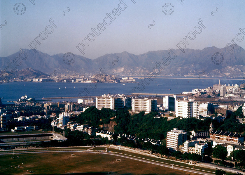 PMR.HK-14 
 Hong Kong 1958: part of a sun-scorched Happy Valley Racecourse with the straits and mainland in the background. 
 Keywords: British colonies, nostalgia, historic, island, tropics, Far East