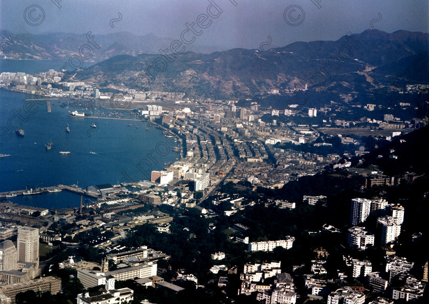 PMR.HK-17 
 Hong Kong 1958: view from the summit of Mount Victoria showing the Wanchai area where most of the night life is to be found. Junk harbour at top left. 
 Keywords: British colonies, nostalgia, historic, island, tropics, Far East