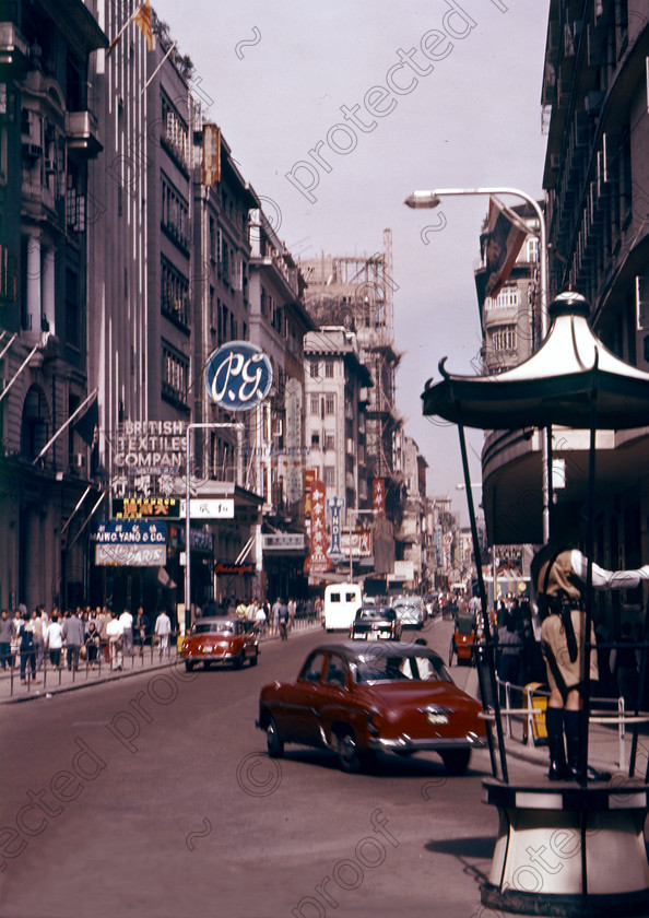 PMR.HK-06 
 Hong Kong 1958: traffic policeman on Queen Street. 
 Keywords: British colonies, nostalgia, historic, island, tropics, Far East