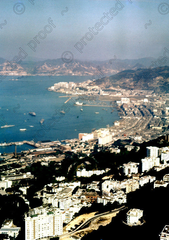 PMR.HK-19 
 Hong Kong 1958: view from the summit of Mount Victoria showing the Wanchai area where most of the night life is to be found. Junk harbour at top left. 
 Keywords: British colonies, nostalgia, historic, island, tropics, Far East
